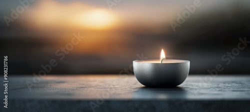 Flickering Candle on a Stone Surface in a Relaxing Outdoor Environment