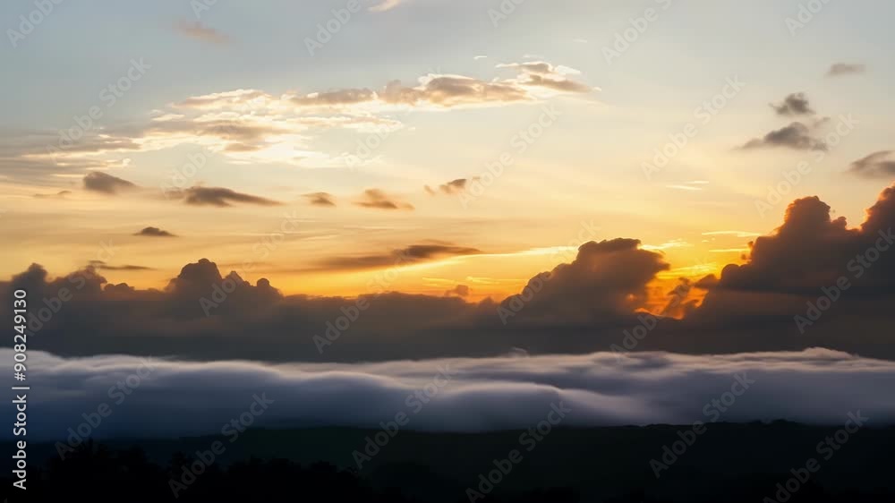 A sea of silver and grey clouds drifting across the sky highlighted by the warm hues of the setting sun. A sea of silver and grey clouds drifting across the sky highlighted by the warm hues of the setting sun.