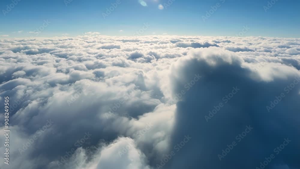 Slowly ascending above a thick layer of clouds revealing a panoramic view of a cloud bank stretching as far as the eye can see.