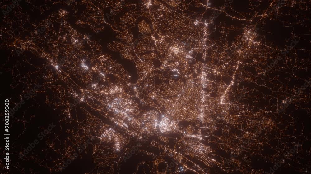 Chattanooga (Tennessee, USA) aerial view at night. Top view on modern city with street lights. Camera is zooming out, rotating clockwise. Vertical video. The north is on the left side