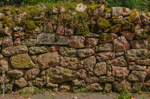 stone wall, texture, Medieval natural stone wall, pink granite, French masonry stone wall, background for photo.