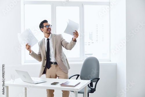 Businessman planning laptop happy office paper holding