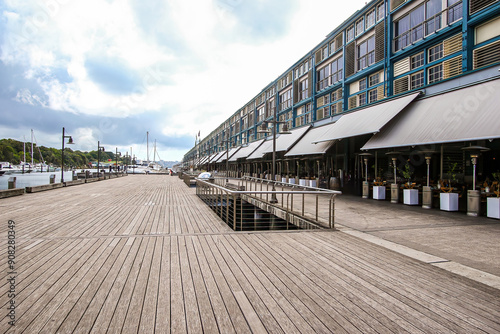 Boardwalk along Finger Wharf, a former passenger terminal turned into a hotel and residential building in Sydney Harbour, New South Wales, Australia