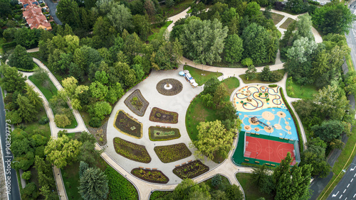 Aerial View of a Beautiful Urban Park With Playground and Garden Spaces in Springtime