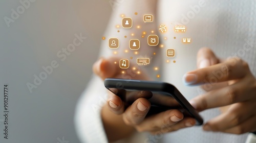 Woman's hand tapping on a mobile banking app, icons of transactions and account balance
