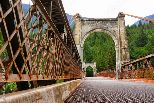 Second Alexandra Bridge, a suspension bridge opened in 1927 spanning the Fraser River within the lower Fraser Canyon of British Columbia, Canada photo