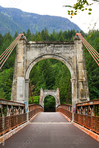 Second Alexandra Bridge, a suspension bridge opened in 1927 spanning the Fraser River within the lower Fraser Canyon of British Columbia, Canada photo