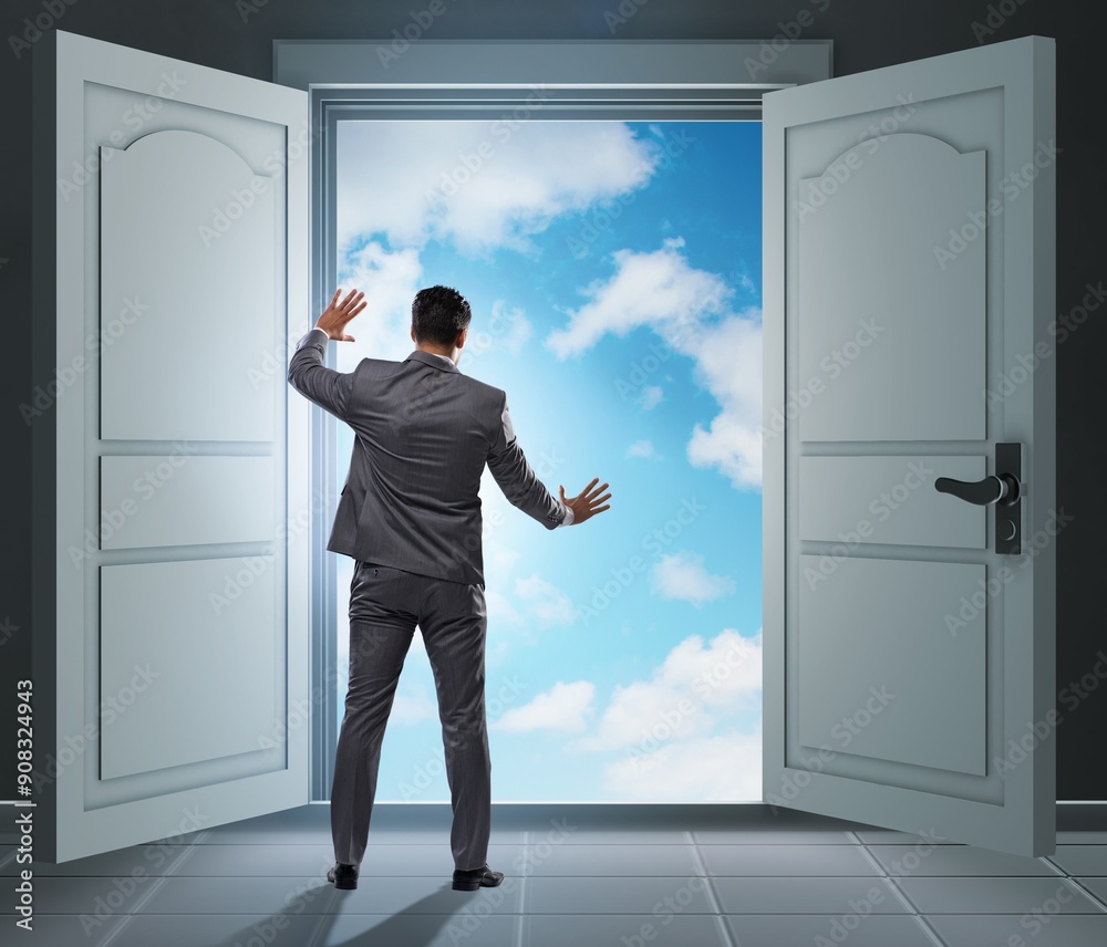 Fototapeta premium Businessman entering big large door