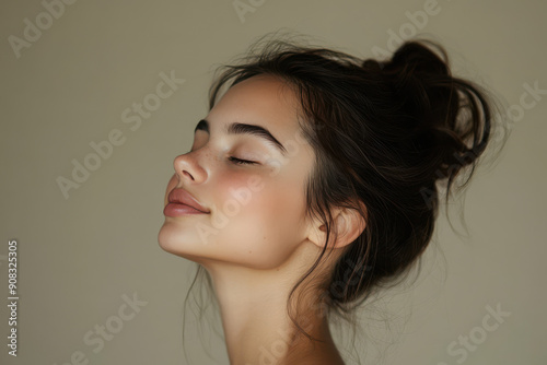 A close up of a girl's face with her eyes closed