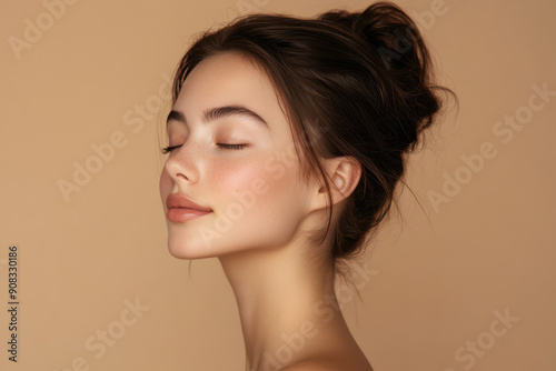 A close up of a girl's face with her eyes closed