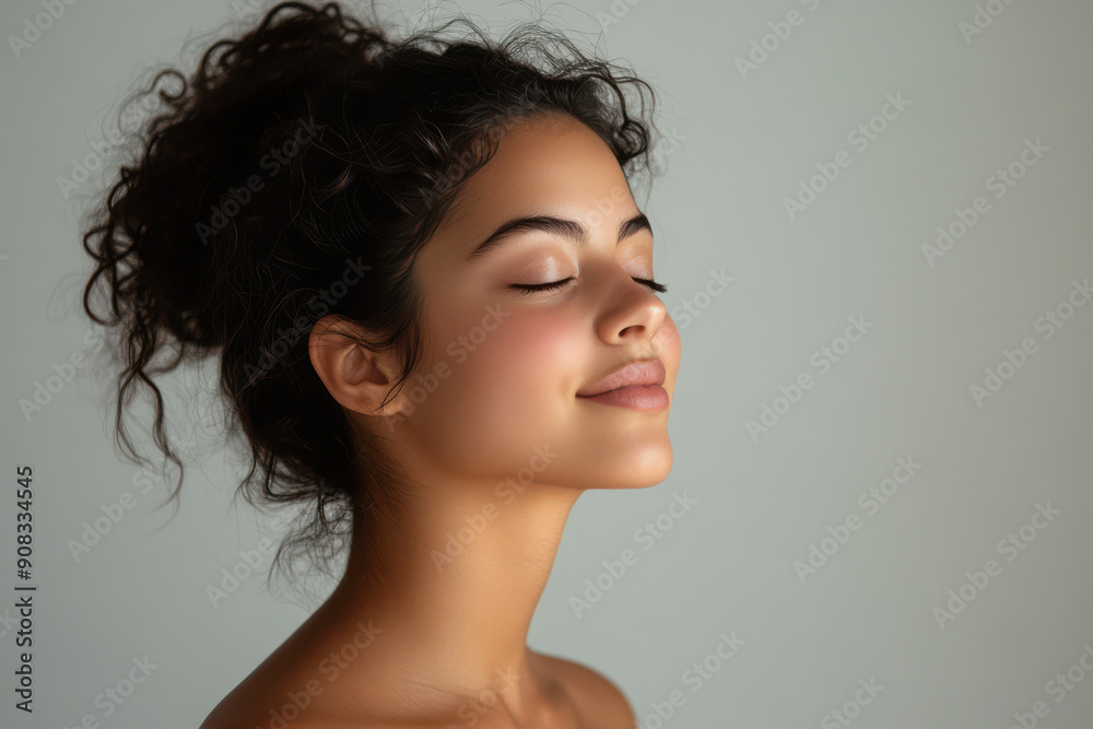 A close up of a girl's face with her eyes closed A close up of a girl's face with her eyes closed