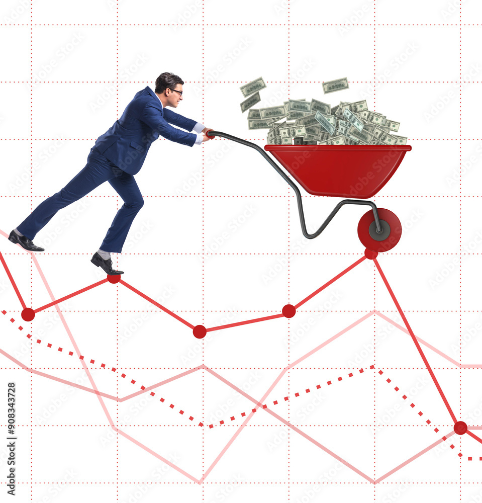 Businessman pushing money wheelbarrow down the chart