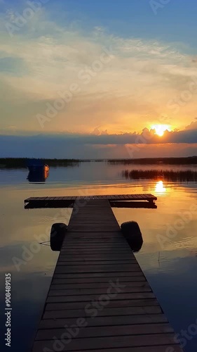 sunset on the lake. vertical