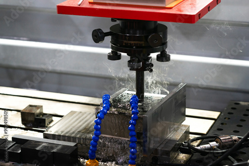 operator use copper EDM electrode to make precision mold and die