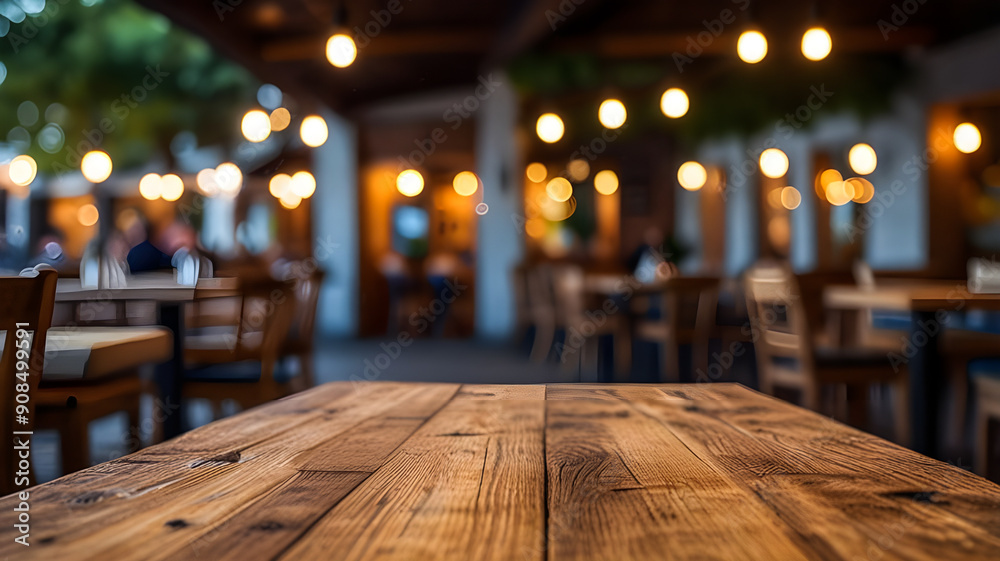 photo wooden table and blurred background of outdoor restaurant with bokeh light. High quality photo 
