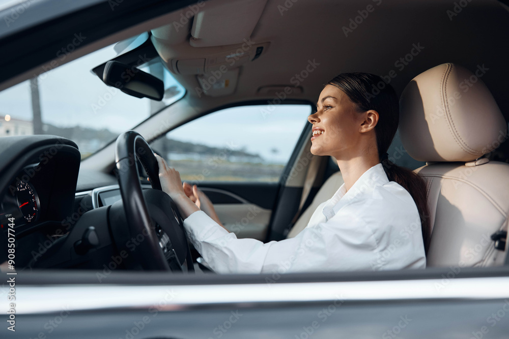 A woman sits in the driver's seat of a car, her hand on the steering wheel, looking directly at the camera with a confident expression, perfectly capturing a moment of attentive driving A woman sits in the driver's seat of a car, her hand on the steering wheel, looking directly at the camera with a confident expression, perfectly capturing a moment of attentive driving