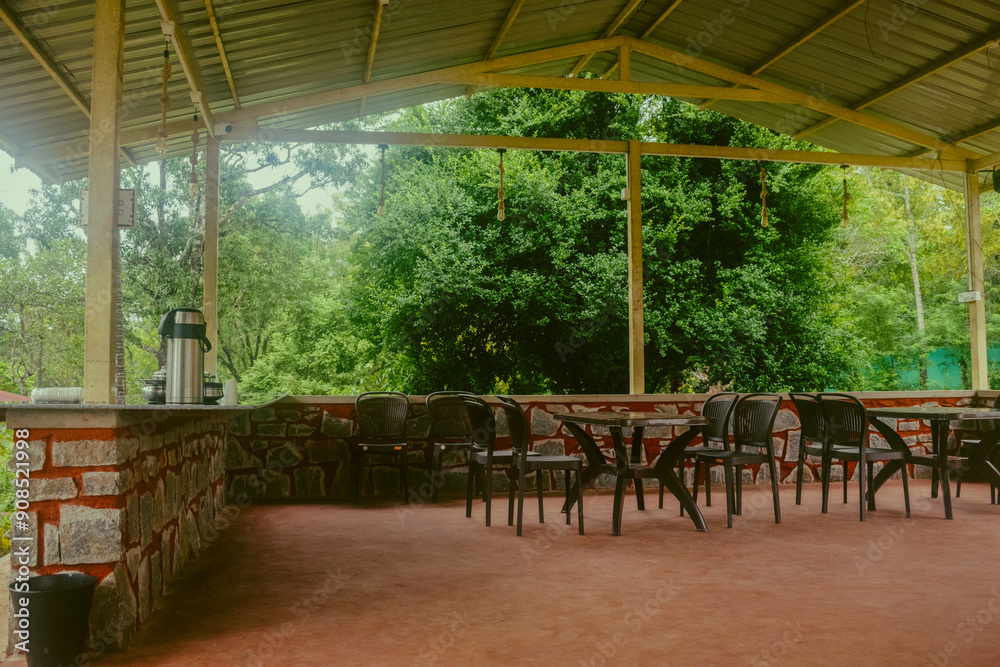 Restaurant interior with chairs, table and chairs in the park. Restaurant interior with chairs, table and chairs in the park.