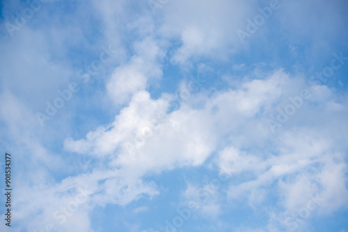 Sky background with clouds. White clouds against a blue sky.