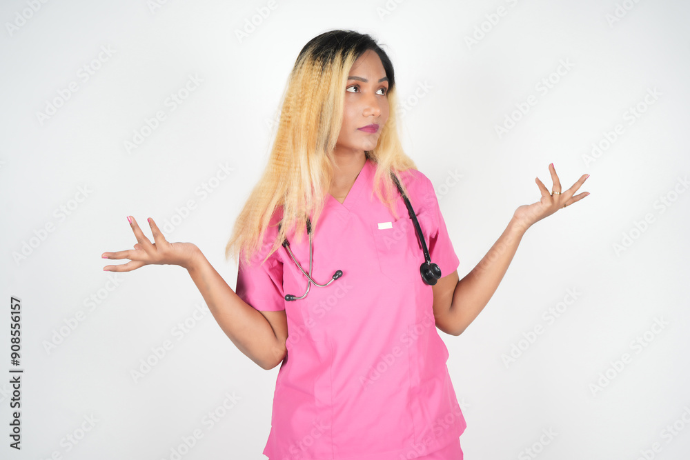 Confused doctor upon hearing news, raising hands up and smiling thrilled Confused doctor upon hearing news, raising hands up and smiling thrilled