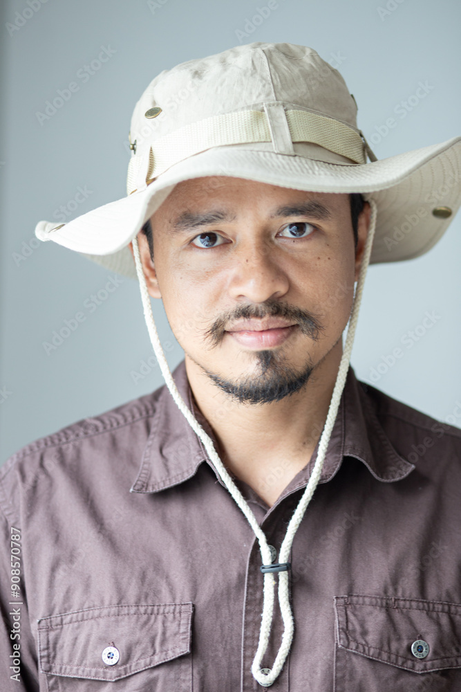 Samart executive camping man with advaenture hat on white background Samart executive camping man with advaenture hat on white background
