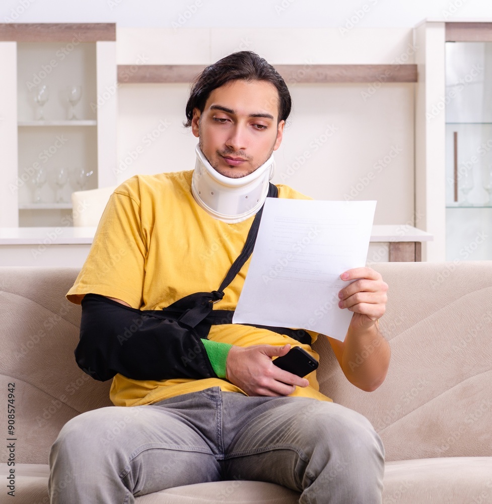 Young man after car accident suffering at home