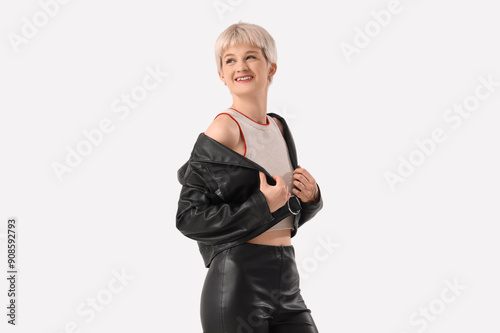 Stylish young woman in leat...