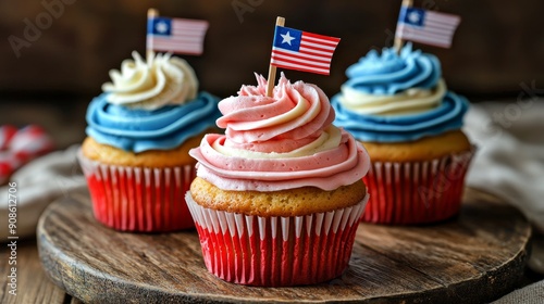 Patriotic Cupcakes with American Flags and Red, White, and Blue Frosting for Independence Day Celebrations