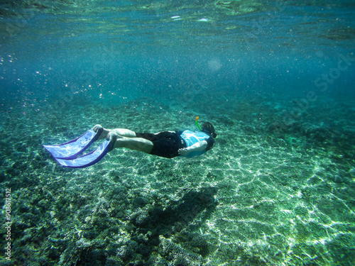 Diver Descending Dead Coral Reef in Bali, 2018