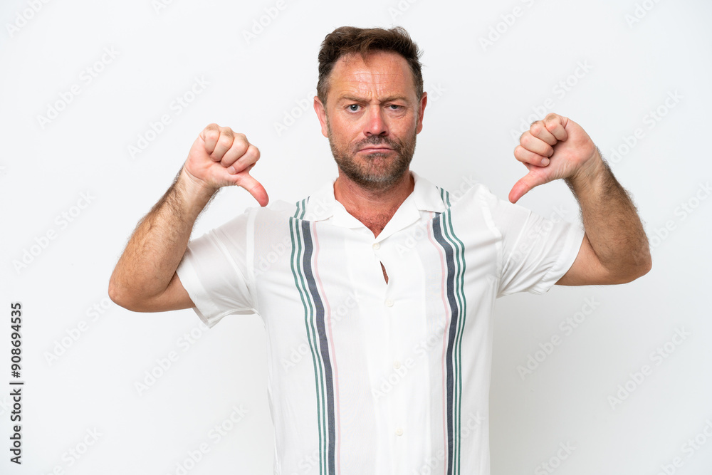 Middle age caucasian man isolated on white background showing thumb down with two hands Middle age caucasian man isolated on white background showing thumb down with two hands