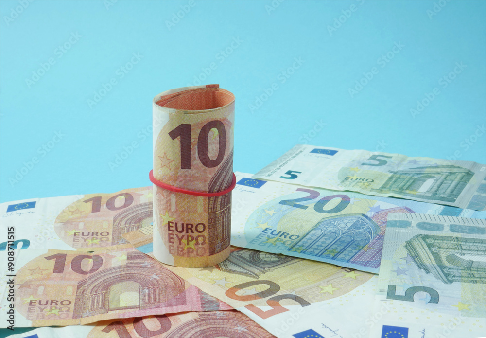 Economy, represented with euro banknotes, concept of saving or spending. Economy, represented with euro banknotes, concept of saving or spending.