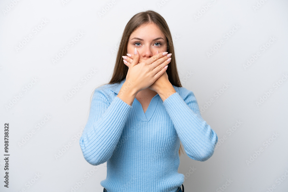 Young Lithuanian woman isolated on white background covering mouth with hands Young Lithuanian woman isolated on white background covering mouth with hands
