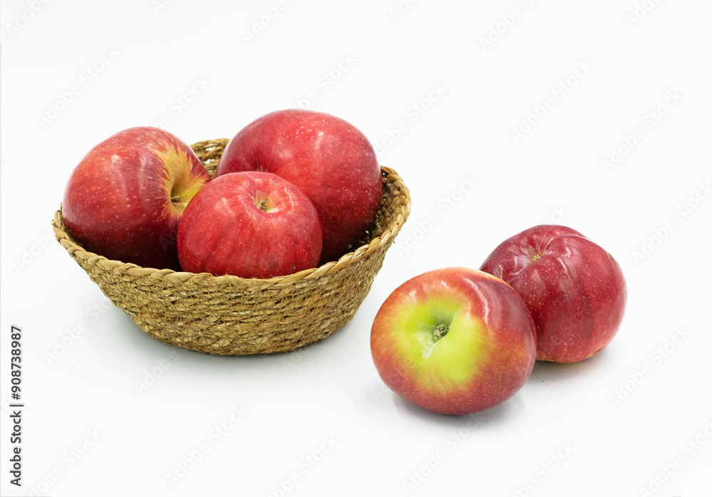 Fresh Red Star apples (Malus domestica 'Redstar') in a basket, isolated on white background Fresh Red Star apples (Malus domestica 'Redstar') in a basket, isolated on white background