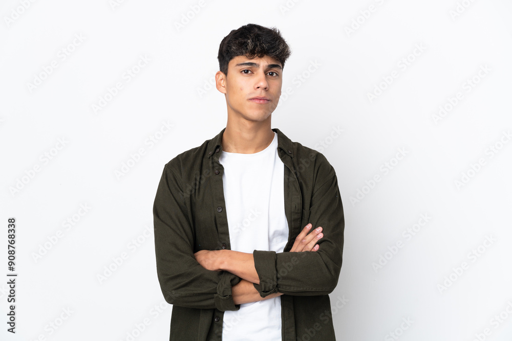 Young man over isolated white background looking to the side Young man over isolated white background looking to the side