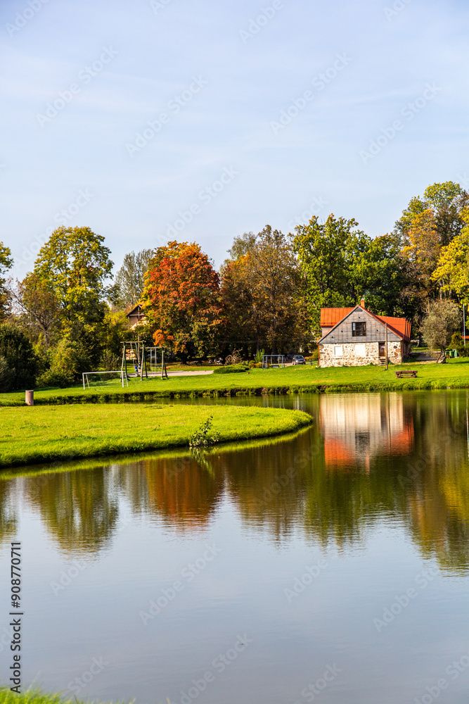 Scandinavian style house on the lake with beautiful blue sky. Scandinavian style house on the lake with beautiful blue sky.