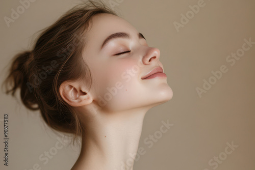 A close up of a girl's face with her eyes closed