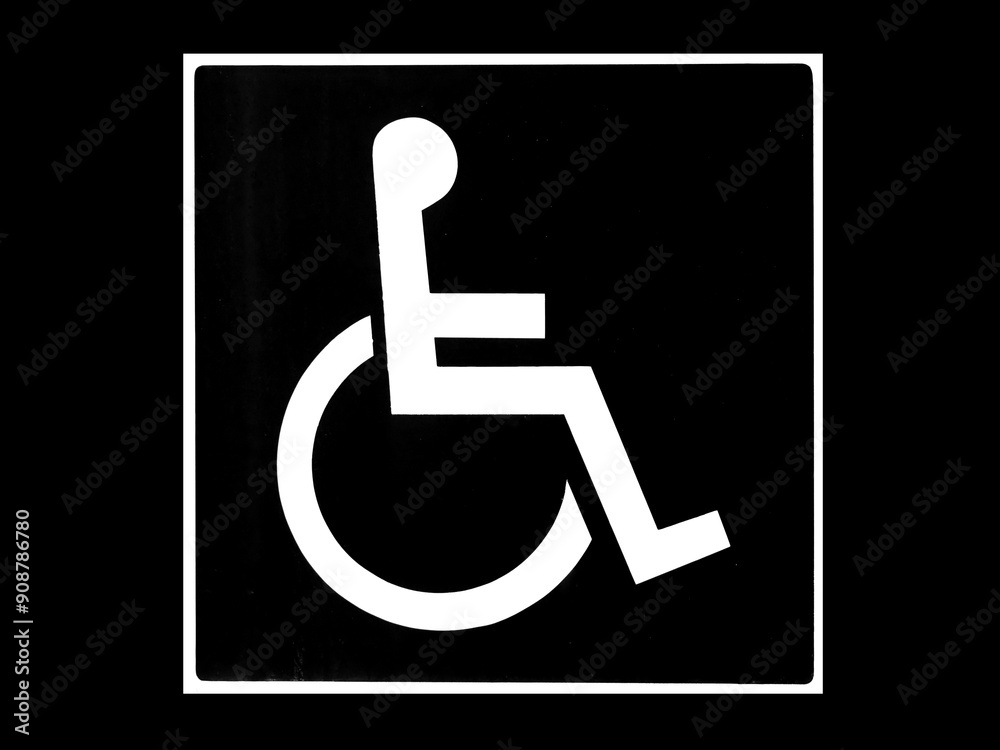 A square black sign with a white wheelchair symbol, indicating a designated parking space for people with disabilities. The sign emphasizes accessibility and reserved parking. Black background A square black sign with a white wheelchair symbol, indicating a designated parking space for people with disabilities. The sign emphasizes accessibility and reserved parking. Black background