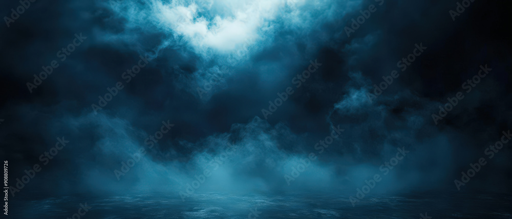 A dark blue sky with clouds and a foggy mist A dark blue sky with clouds and a foggy mist