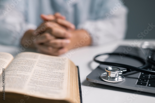 Wallpaper Mural Doctor clasped their hands in prayer, hoping for the best as they provided medical care in hospital clinic. doctor, pray, medicine, health, medical, hand, hospital, care, clinic, hope, prayer, person. Torontodigital.ca
