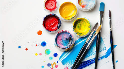 Wallpaper Mural Bright jars of colorful paint and brushes are scattered across an artist's table, radiating creative energy and inspiration. Torontodigital.ca