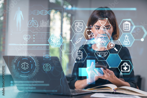 Woman using smartphone with holographic medical icons overlayed on screen. photo