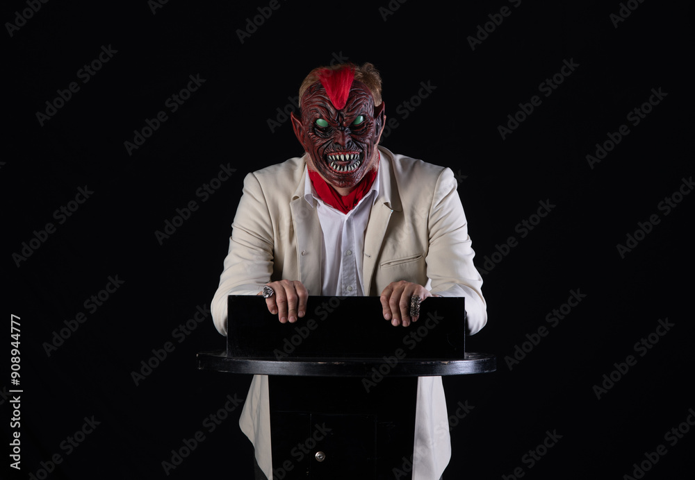 devil with a microphone on the podium devil with a microphone on the podium