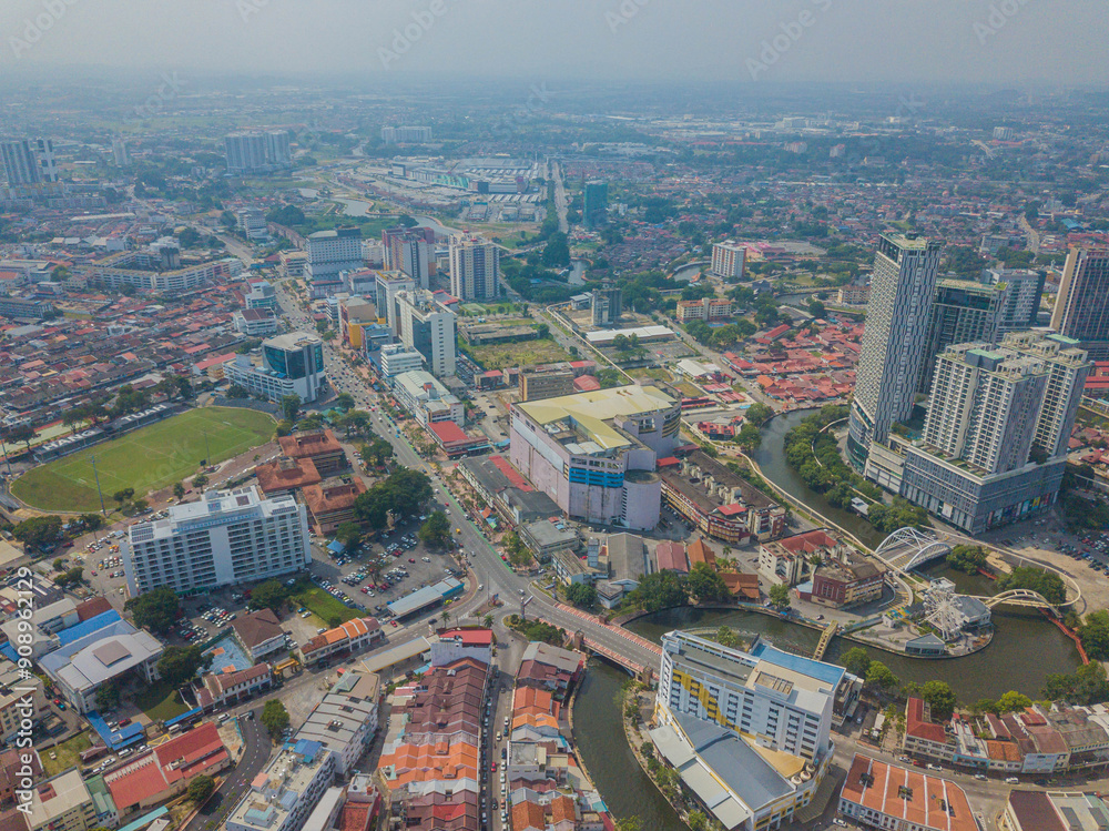 Obraz premium Aerial drone view of big and dense Malacca City with Malaysian settlements at Melaka, Malaysia.