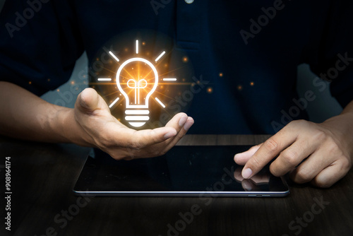 Business people using cloud technology to connect business data ,The cloud computing concept concept is shown in hand. ,Network and internet services for business ideas, ideas,light bulbs in hand