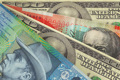 Australian dollar and US dollar banknotes. Cash. Financial concept.
