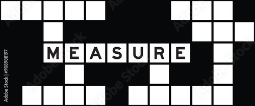 Alphabet letter in word measure on crossword puzzle background