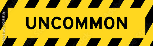 Yellow and black color with line striped label banner with word uncommon