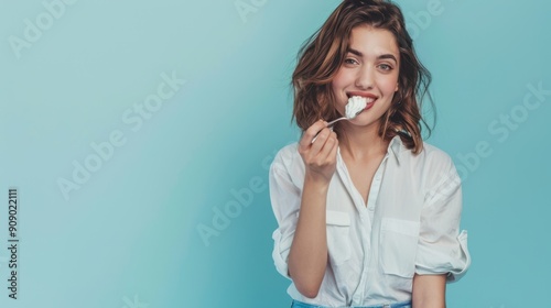 the woman eating yogurt