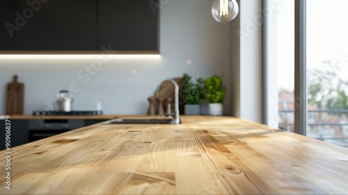 Modern kitchen interior in a bright apartment  featuring elegant furniture and minimalist design.