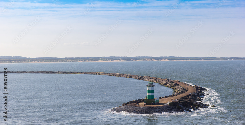 South pier in the North Sea at the harbor of IJmuiden, Netherlands