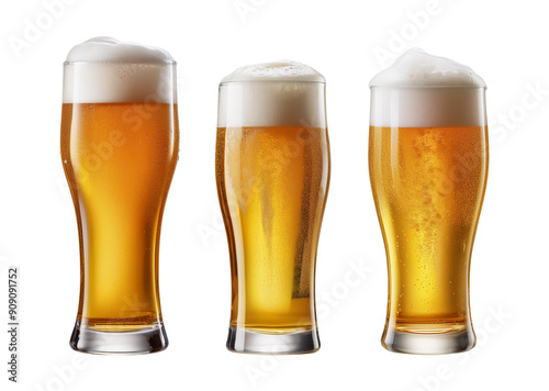 Three glasses of light beer with frothy heads, showcasing different shades of golden amber on a white background.